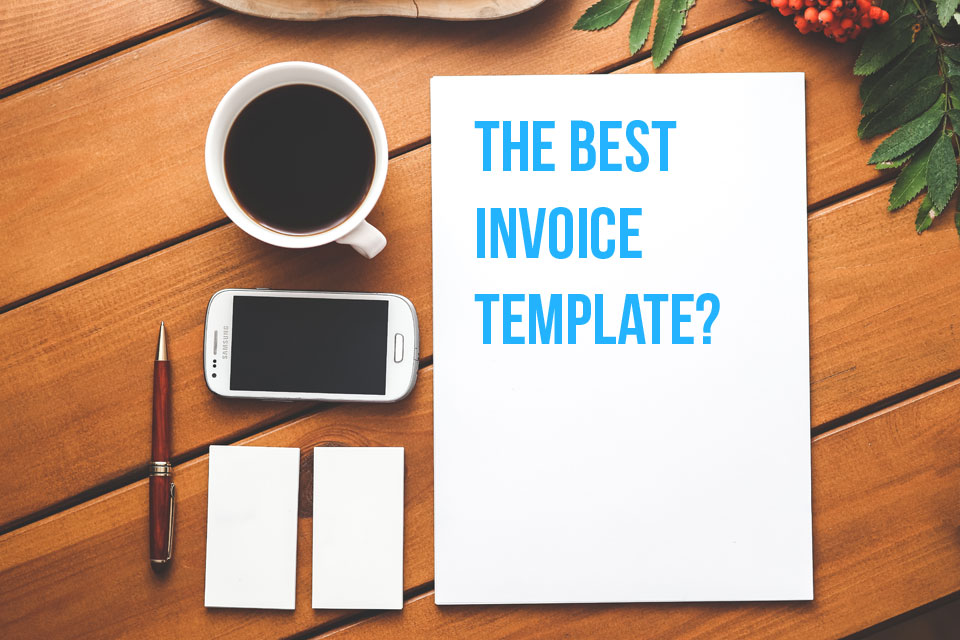 This coffee, cell phone and blank piece of paper on a desk are asking you what the best invoice template should look like